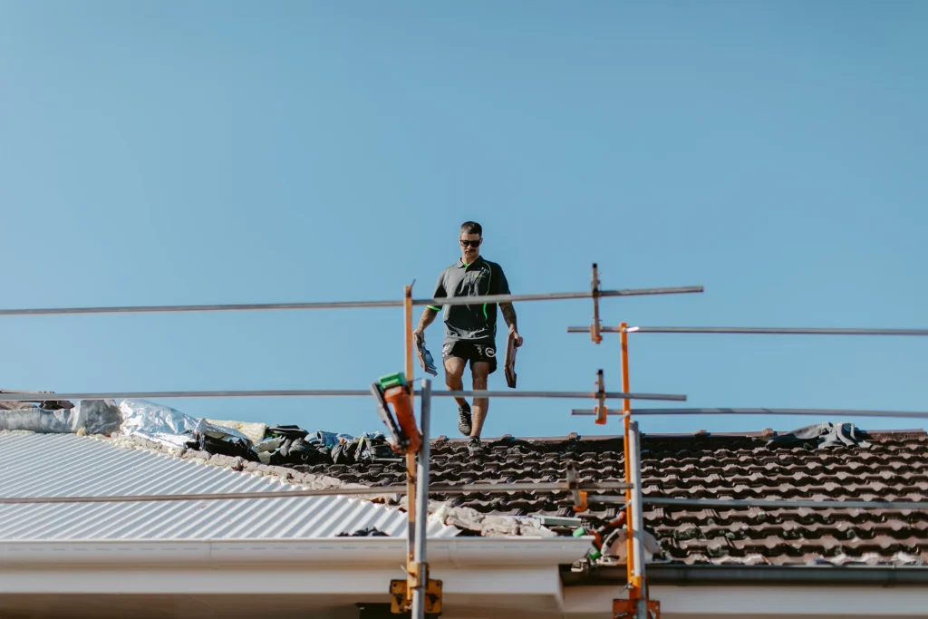 Before and after roof replacement project, roof builder Newcastle
